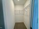 Walk-in closet with carpet flooring and wire shelving at 196 Grand Griffon Way, Lillington, NC 27546