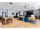 Community room with comfortable seating and a large TV at 222 Glenwood Ave # 307, Raleigh, NC 27603