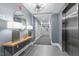 Modern hallway with elevator access and stylish decor at 222 Glenwood Ave # 307, Raleigh, NC 27603