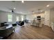 Bright and airy living area with an open floor plan connecting the kitchen and living spaces at 152 S Mistflower St, Clayton, NC 27520