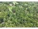 Property features a tranquil wooded landscape, creating a private and peaceful residential environment at 184 Pine E St, Lillington, NC 27546