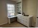 The bedroom features a built-in dresser and shelving at 184 Pine E St, Lillington, NC 27546