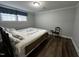 Bedroom features new flooring and neutral walls; bright and spacious at 184 Pine E St, Lillington, NC 27546