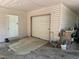 Spacious garage with convenient roll-up door, offering ample storage and workspace at 184 Pine E St, Lillington, NC 27546