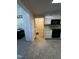 Bright kitchen with white cabinetry and black appliances at 184 Pine E St, Lillington, NC 27546