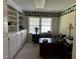 Bright office space with built-in shelves, two desks and large windows at 184 Pine E St, Lillington, NC 27546