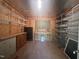 Versatile outbuilding interior featuring built-in shelving and ample workspace for projects at 184 Pine E St, Lillington, NC 27546
