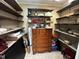 This pantry features shelves and dresser for extra storage at 184 Pine E St, Lillington, NC 27546