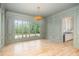 This dining room features detailed trim work, hardwood floors and a view of the outdoors at 222 Kenwood Ln, Pittsboro, NC 27312
