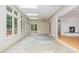 This sunroom features tile floors, skylights and several windows for natural light at 222 Kenwood Ln, Pittsboro, NC 27312
