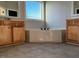The primary bathroom contains wooden cabinets with a tub in the middle at 941 Olive Branch Dr, Smithfield, NC 27577