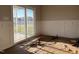 Room featuring a sliding glass door leading to the patio and decorative wall trim at 941 Olive Branch Dr, Smithfield, NC 27577