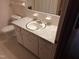 Bathroom featuring white tiled walls, tiled floor, and a vanity with round sink and white cabinets at 1917 New Hill Olive Chapel Rd, New Hill, NC 27562