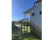 New back porch and stairway provide additional outdoor space and access to the home at 195 N Smith St, Clayton, NC 27520