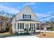 Charming two-story home with a welcoming front porch and manicured landscaping at 195 N Smith St, Clayton, NC 27520