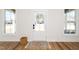 Inviting entryway with natural light and stylish rug at 199 N Smith St, Clayton, NC 27520