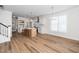 Kitchen view showcasing the island with seating and bright lighting at 201 N Smith St, Clayton, NC 27520