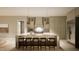 Modern kitchen with a large island, stainless steel appliances, and stylish pendant lighting at 725 Catawba St, Raleigh, NC 27609
