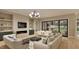 Modern living room featuring a sleek fireplace, stylish decor, and large sliding glass doors for natural light at 725 Catawba St, Raleigh, NC 27609