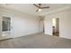 Bright bedroom featuring a ceiling fan and access to the outdoors at 73 Jumper St, Wendell, NC 27591