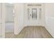 Front entry with hardwood floors and white door at 73 Jumper St, Wendell, NC 27591