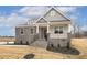 Charming house with stone facade and covered porch at 73 Jumper St, Wendell, NC 27591