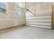 Spacious garage with an open garage door at 73 Jumper St, Wendell, NC 27591