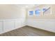 Bright office with wood flooring and wainscoting at 73 Jumper St, Wendell, NC 27591