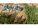 Aerial view of a home with a large lot surrounded by trees at 30 Chestnut Oak Dr, Youngsville, NC 27596