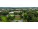 Aerial shot of the clubhouse, pool, and surrounding trees at 4110 Argyle Trl, Burlington, NC 27215