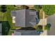 Aerial view showcasing the home's roof, patio, driveway, and well-maintained landscaping at 4110 Argyle Trl, Burlington, NC 27215