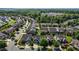An aerial view of a community of houses nestled among the trees at 4110 Argyle Trl, Burlington, NC 27215