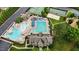Aerial image of the community pool, tennis courts, and clubhouse at 4110 Argyle Trl, Burlington, NC 27215