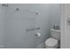 Powder room featuring blue walls and a toilet with tissue at 4110 Argyle Trl, Burlington, NC 27215