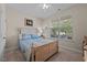 Bedroom with a large window at 4110 Argyle Trl, Burlington, NC 27215