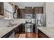 Updated kitchen with stainless steel appliances, granite countertops, and ample cabinet space at 4110 Argyle Trl, Burlington, NC 27215