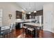 Modern kitchen with granite countertops, stainless steel appliances, and breakfast bar seating at 4110 Argyle Trl, Burlington, NC 27215