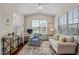 Cozy room features hardwood floors, bright light, and a ceiling fan at 4110 Argyle Trl, Burlington, NC 27215