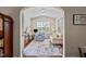 Cozy room features hardwood floors, bright light, and a ceiling fan at 4110 Argyle Trl, Burlington, NC 27215