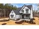 Beautiful home with stylish black trim and landscaping at 45 Chestnut Oak Dr, Youngsville, NC 27596