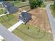Aerial view of a two story home on a large lot at 22 Van Winkle St, Lillington, NC 27546