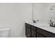 Bathroom with double vanity, large mirror and shower/tub combo at 22 Van Winkle St, Lillington, NC 27546