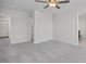 Spacious bedroom with carpet flooring and access to closets and bathroom at 22 Van Winkle St, Lillington, NC 27546