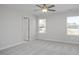 Charming bedroom with ceiling fan, neutral walls and carpet at 22 Van Winkle St, Lillington, NC 27546