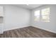 Bright dining area with hardwood floors and large windows at 22 Van Winkle St, Lillington, NC 27546