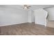 Large living room with hardwood floors and stairs at 22 Van Winkle St, Lillington, NC 27546