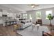 Bright and airy living room with hardwood floors, modern furniture, and an open floor plan at 22 Van Winkle St, Lillington, NC 27546