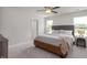 Calm and inviting bedroom with large windows, soft carpet, and neutral colors for a relaxing retreat at 22 Van Winkle St, Lillington, NC 27546