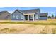New single-story home featuring an open backyard with space for personalization at 208 Hillwood Dr, Sanford, NC 27332