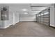 This garage is spacious and features a water heater and overhead storage racks at 208 Hillwood Dr, Sanford, NC 27332